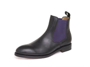 Chelsea Boots in in schwarz mit lila Einsatz